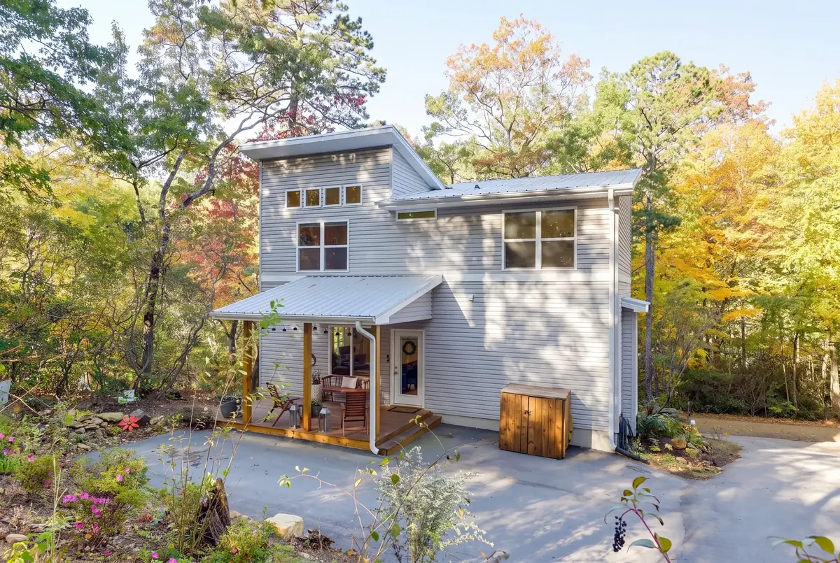 A two-story mountain home with numbered markers for where each catch was found