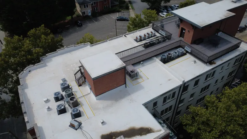 Drone photo from one of our commercial building inspections, showing a flat roof with rooftop units
