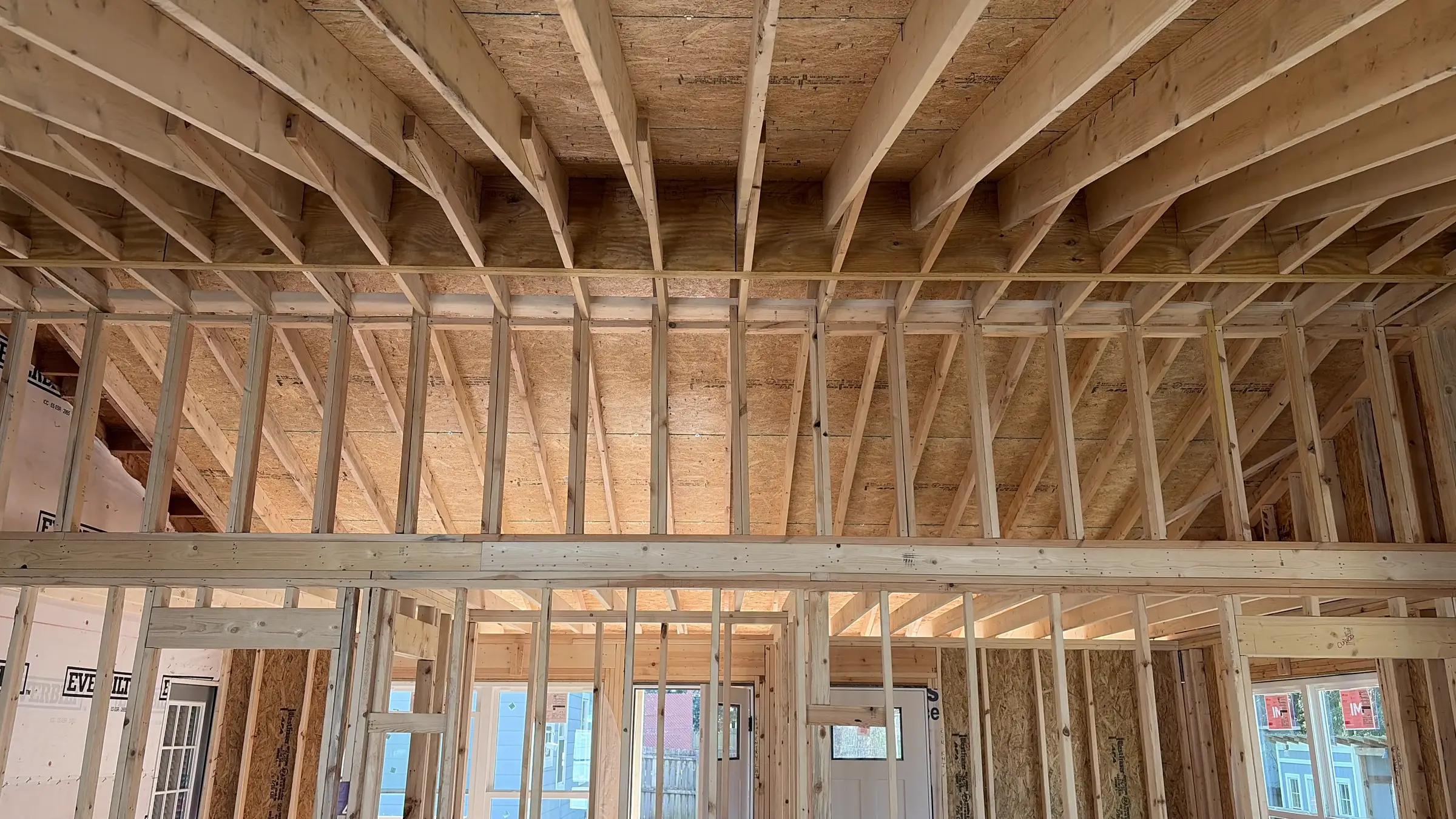 Wall framing inside a home under construction in the Asheville area, photographed by AVL Inspections